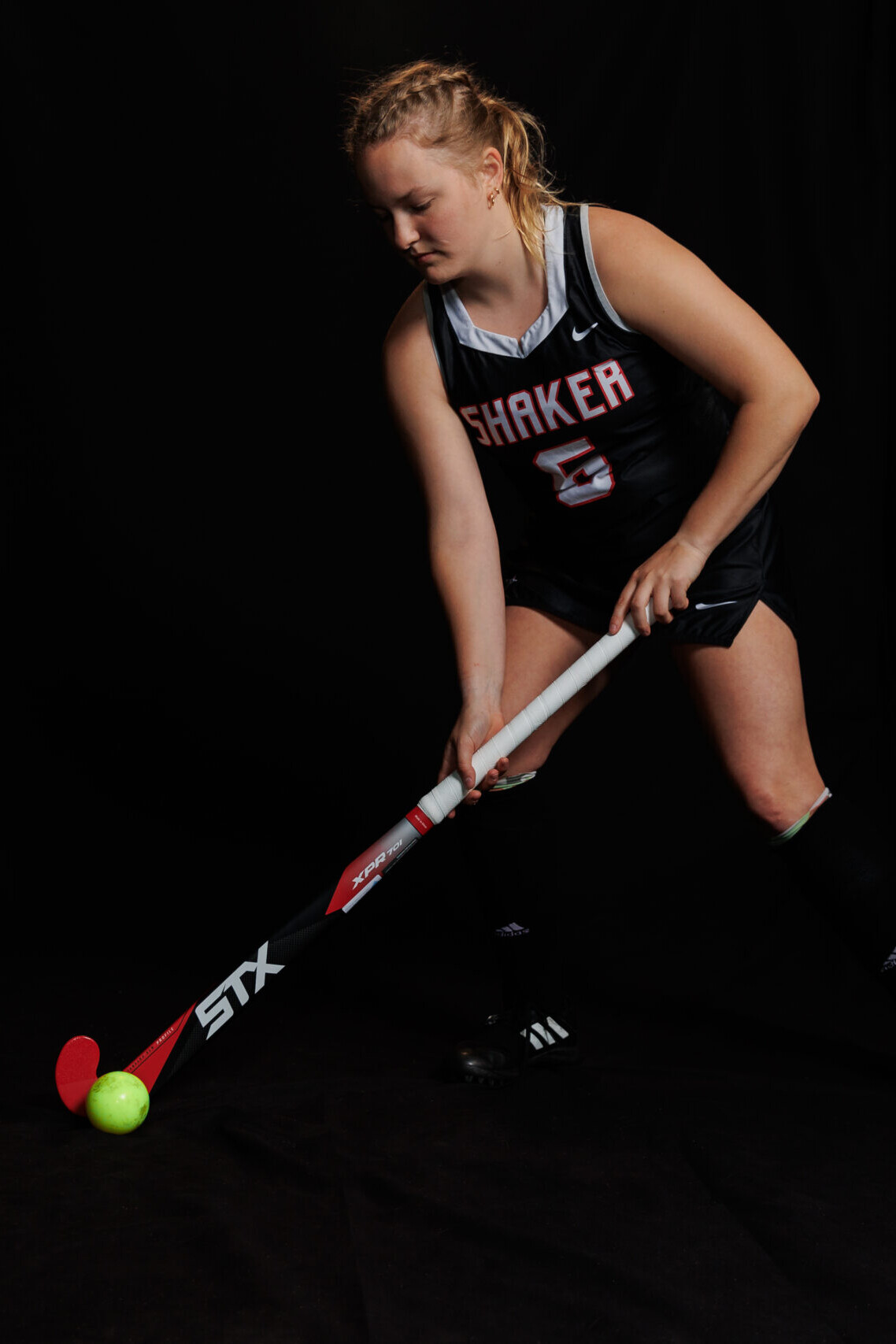 Fortis Sports Girl Hitting Field Hockey Ball